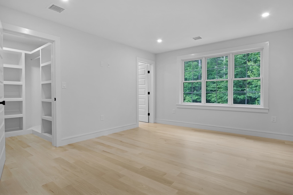 293 Cross Street Norwell, MA 02061 - Photo 28 of 38 an empty room with windows and closet