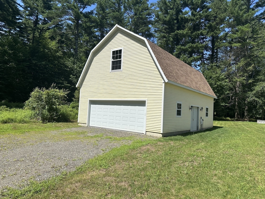 293 Cross Street Norwell, MA 02061 - Photo 36 of 38 a view of a house with yard and a garden