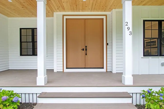 a kitchen with a sink a counter space cabinets and stainless steel appliances