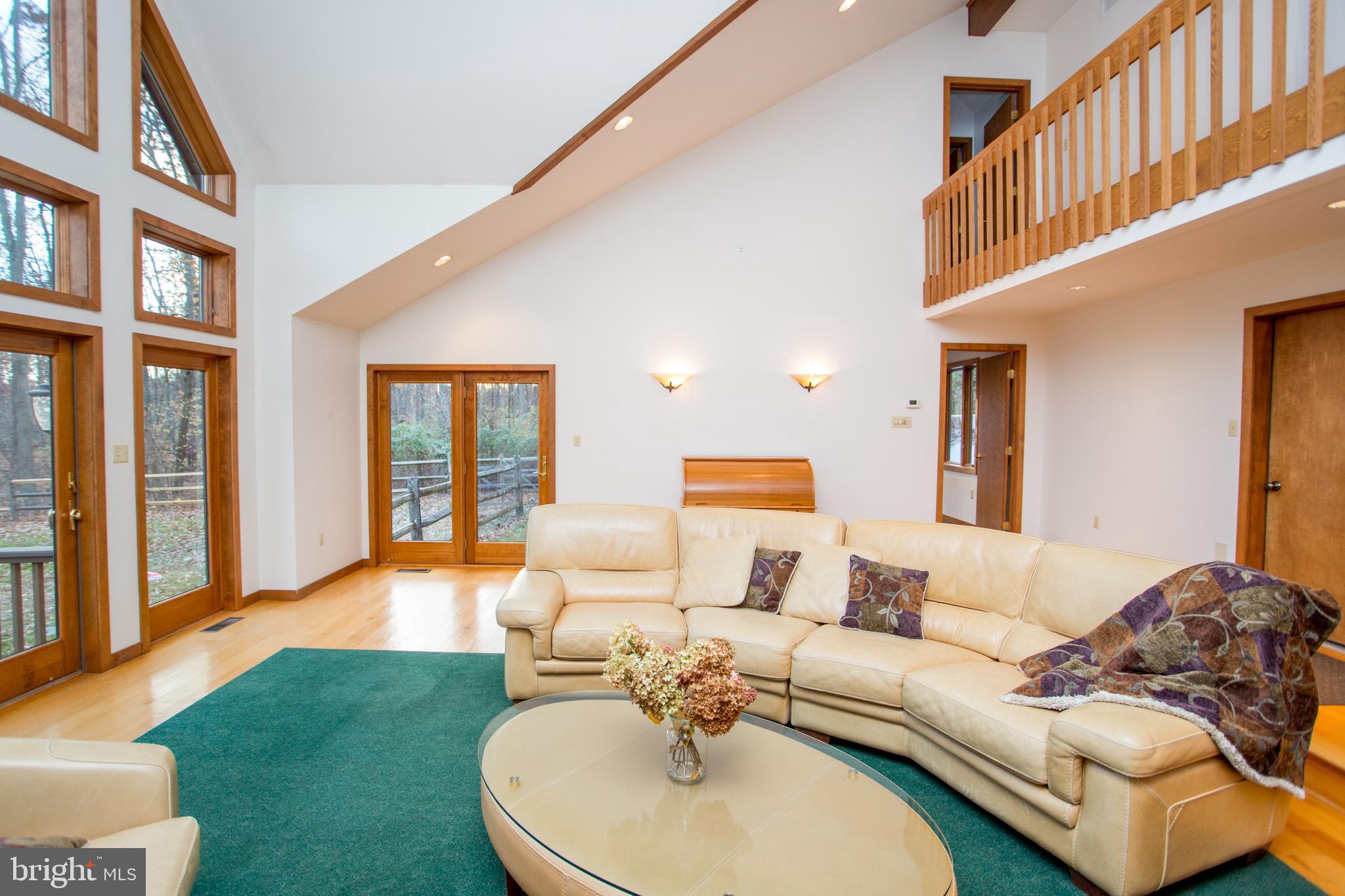 786 Ridge Road Telford, PA 18969 - Photo 47 of 105 a living room with furniture and a table