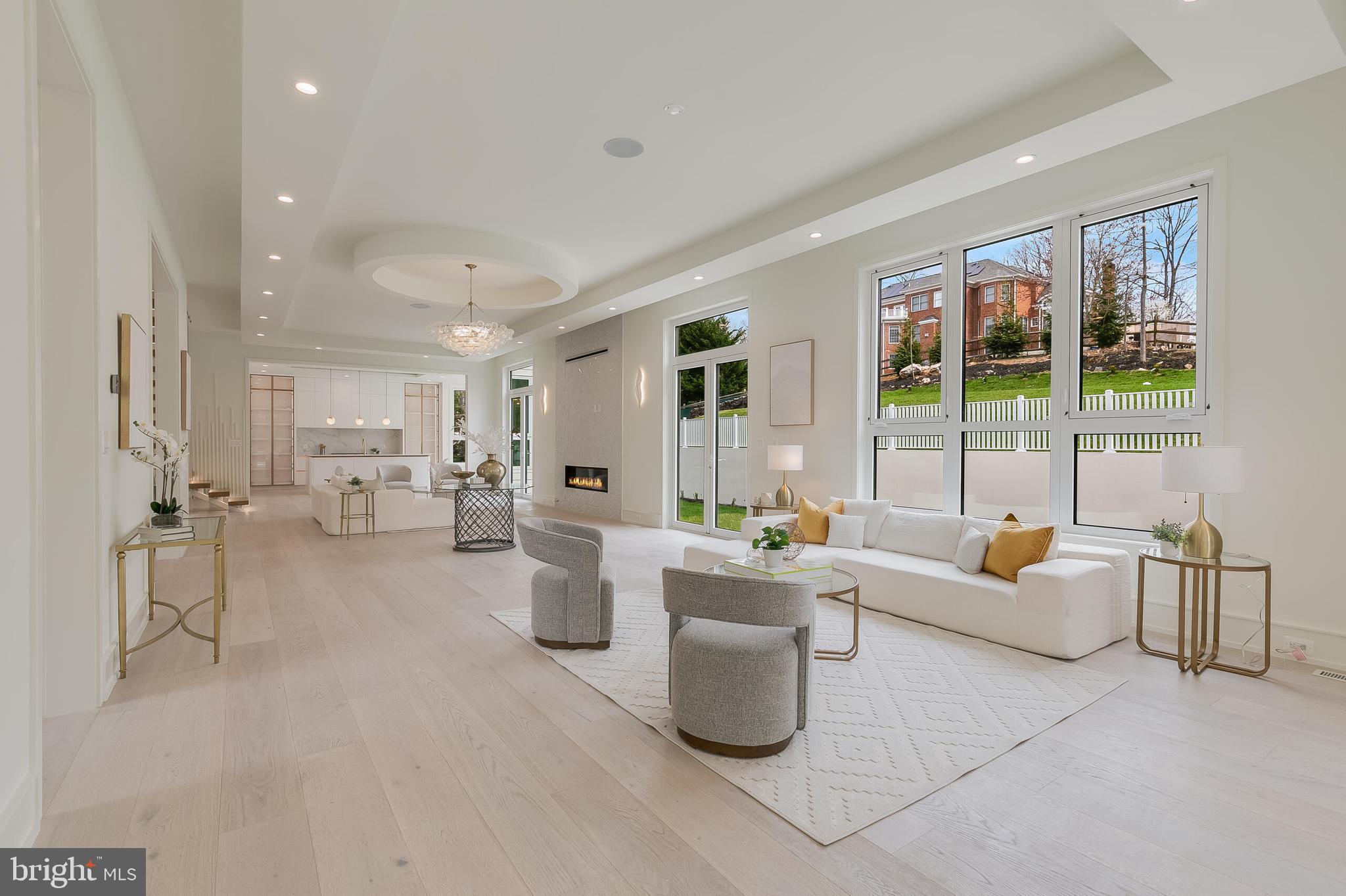 8757 Brook Road McLean, VA 22102 - Photo 11 of 45 a living room with furniture and a large window