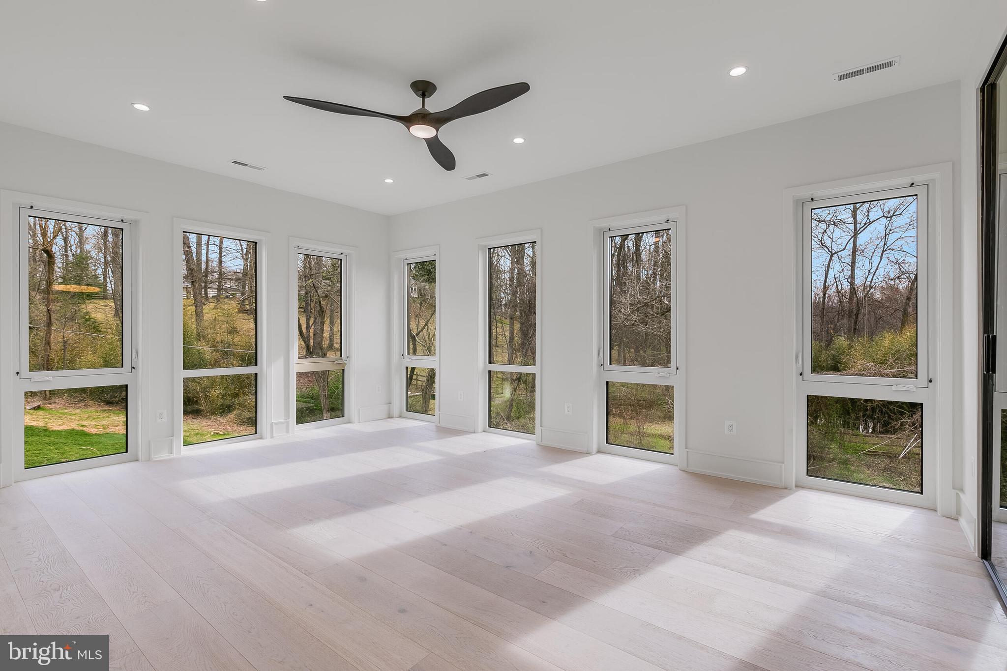 8757 Brook Road McLean, VA 22102 - Photo 23 of 45 a view of an empty room with window and cabinet