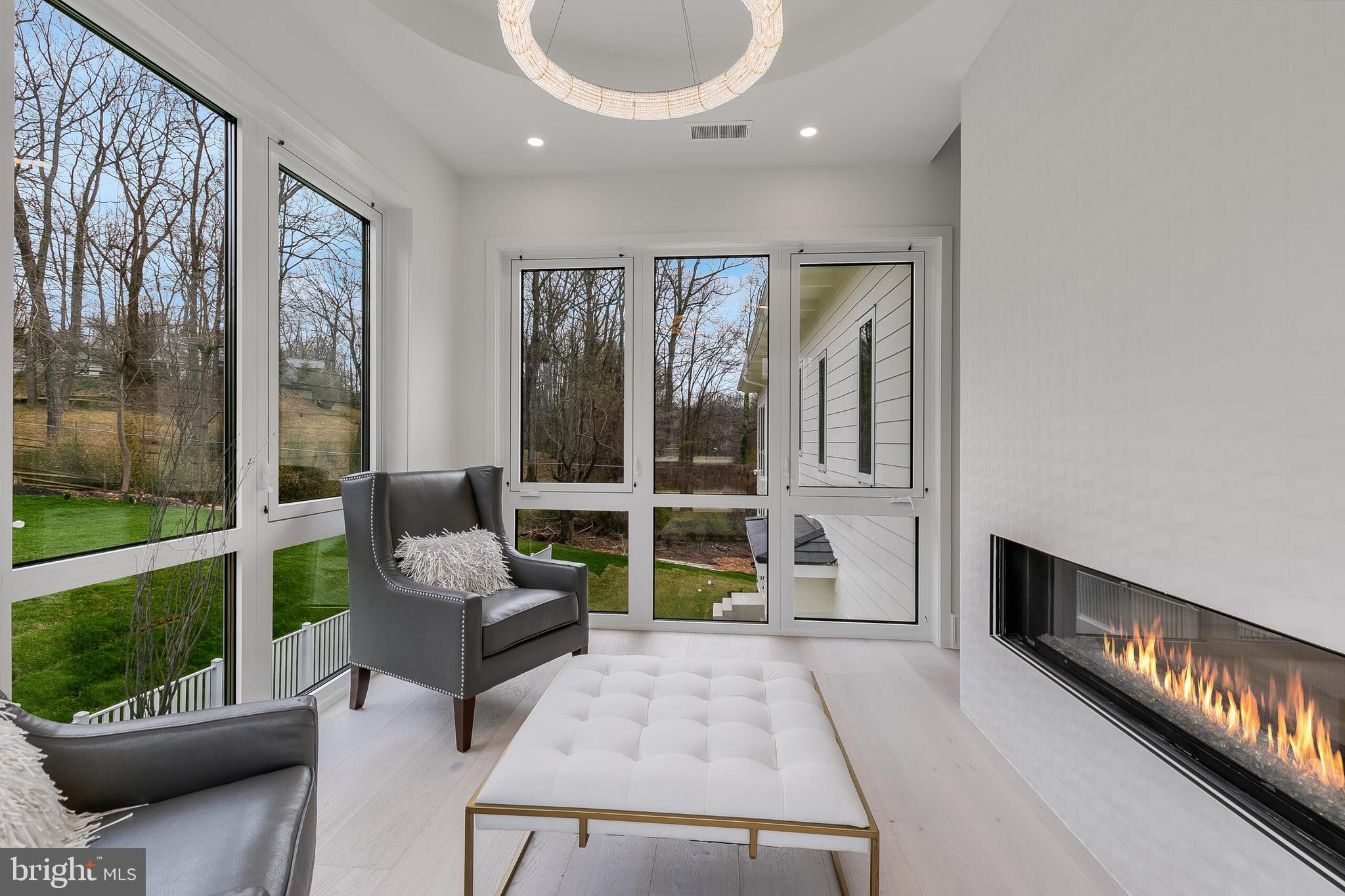 8757 Brook Road McLean, VA 22102 - Photo 26 of 45 a living room with furniture and a gate
