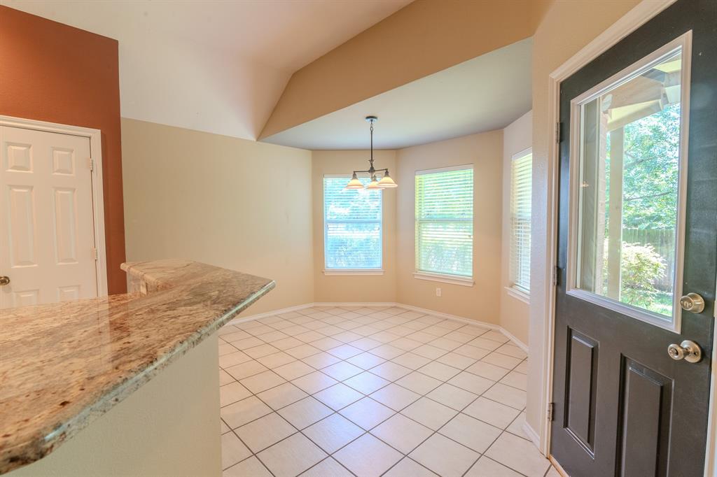6014 Brenhaven Road Arlington, TX 76017 - Photo 7 of 18 room with tiled floors and bay windows
