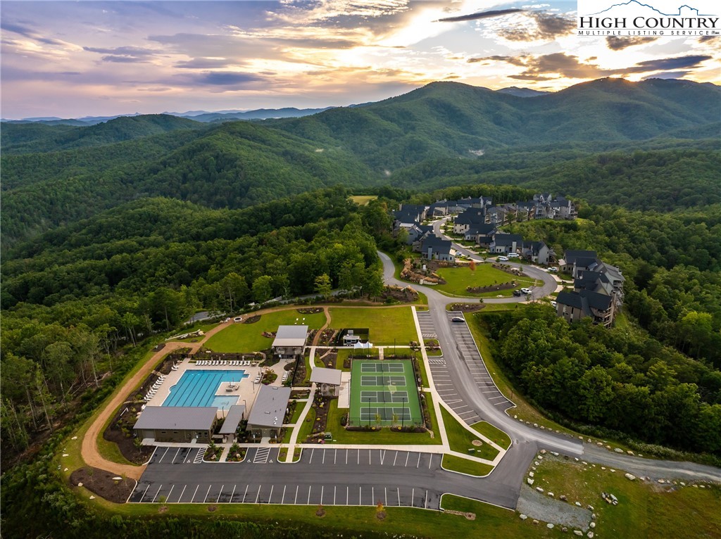 353 Calico Court Boone, NC 28607 - Photo 47 of 50 a view of a swimming pool with mountains in the background