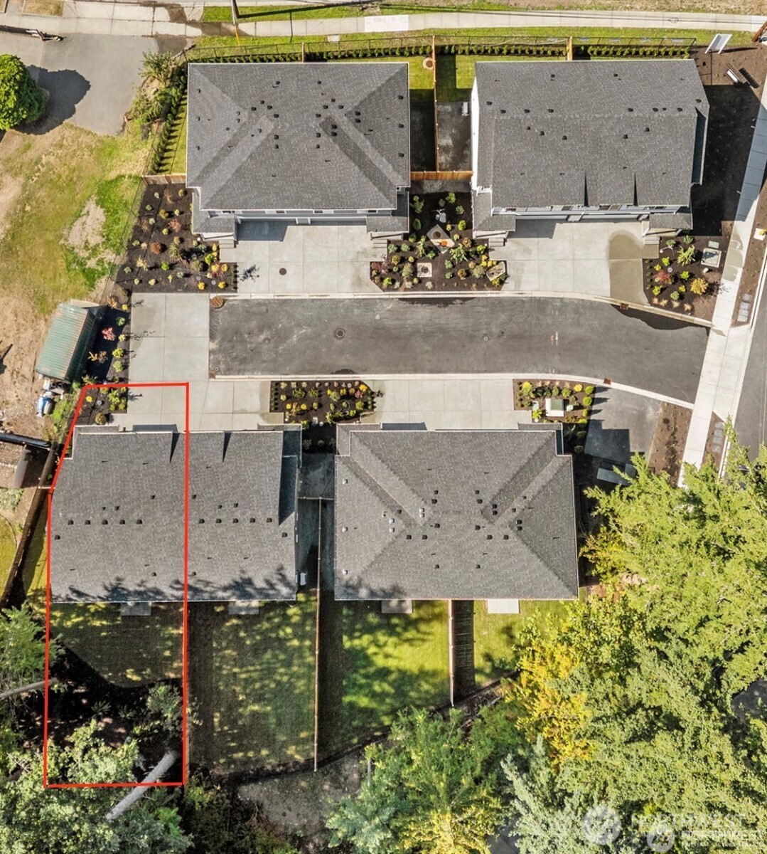 122 169th Place Southwest, Unit B Bothell, WA 98012 - Photo 3 of 22 an aerial view of residential houses with outdoor space