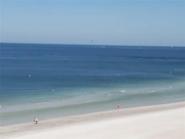 a view of wooden floor and white walls