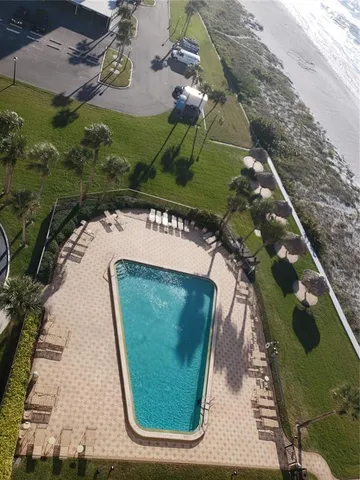 an aerial view of a swimming pool