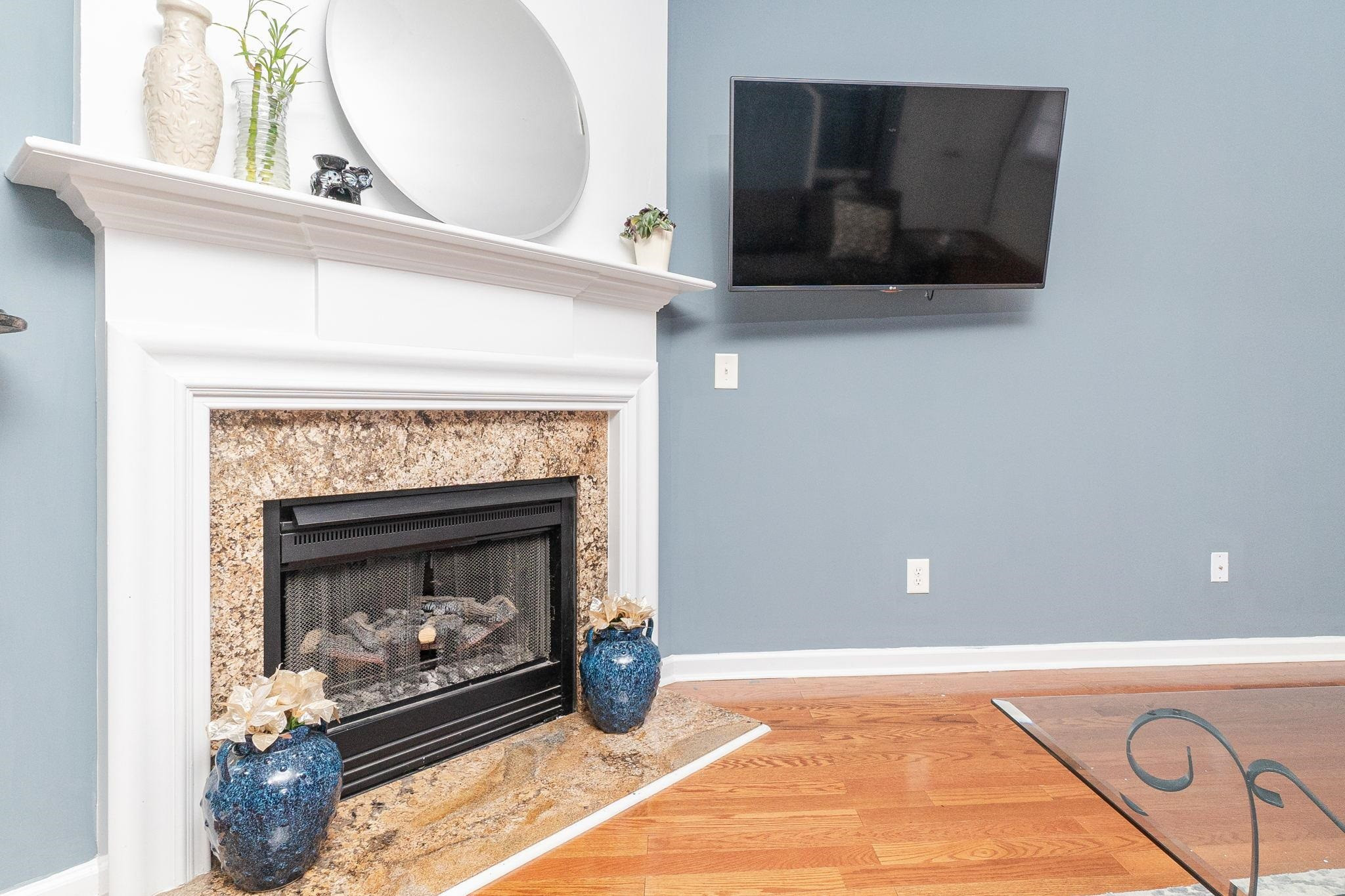 8517 Bright Loop Raleigh, NC 27613 - Photo 6 of 33 Cozy Fireplace