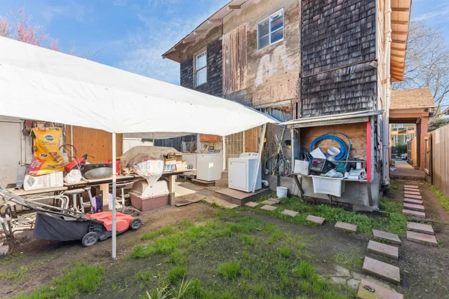 a view of an chairs and tables in patio