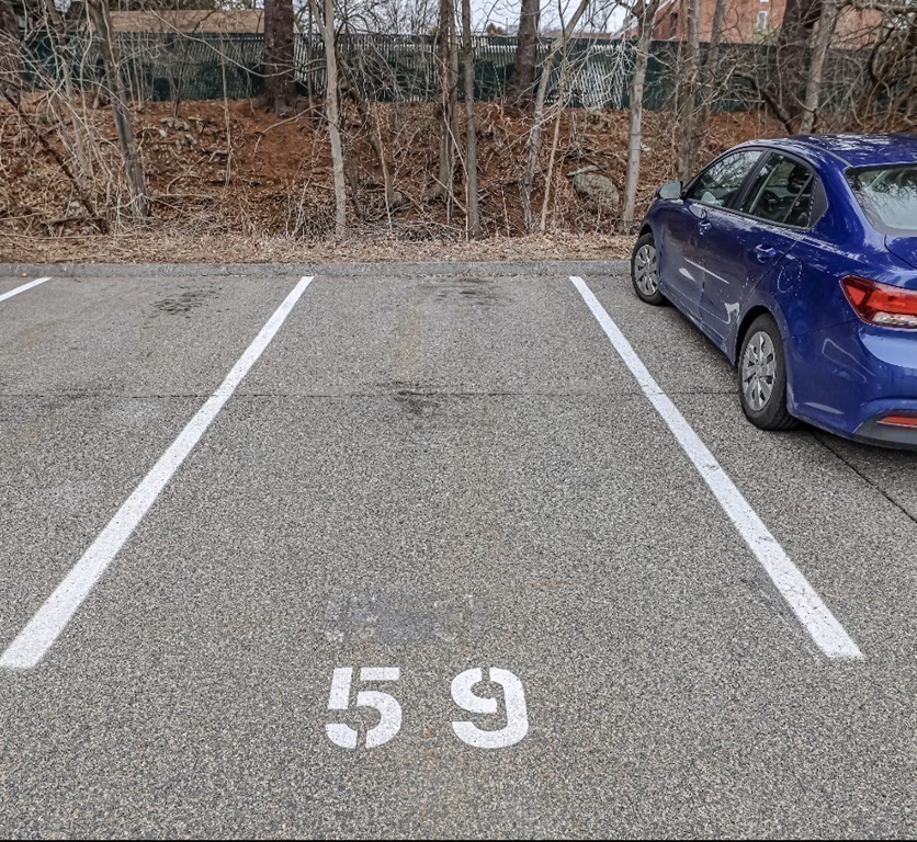 10 Bryon Road, Unit 4 Boston, MA 02467 - Photo 23 of 27 a view of a car parked on the side of the road