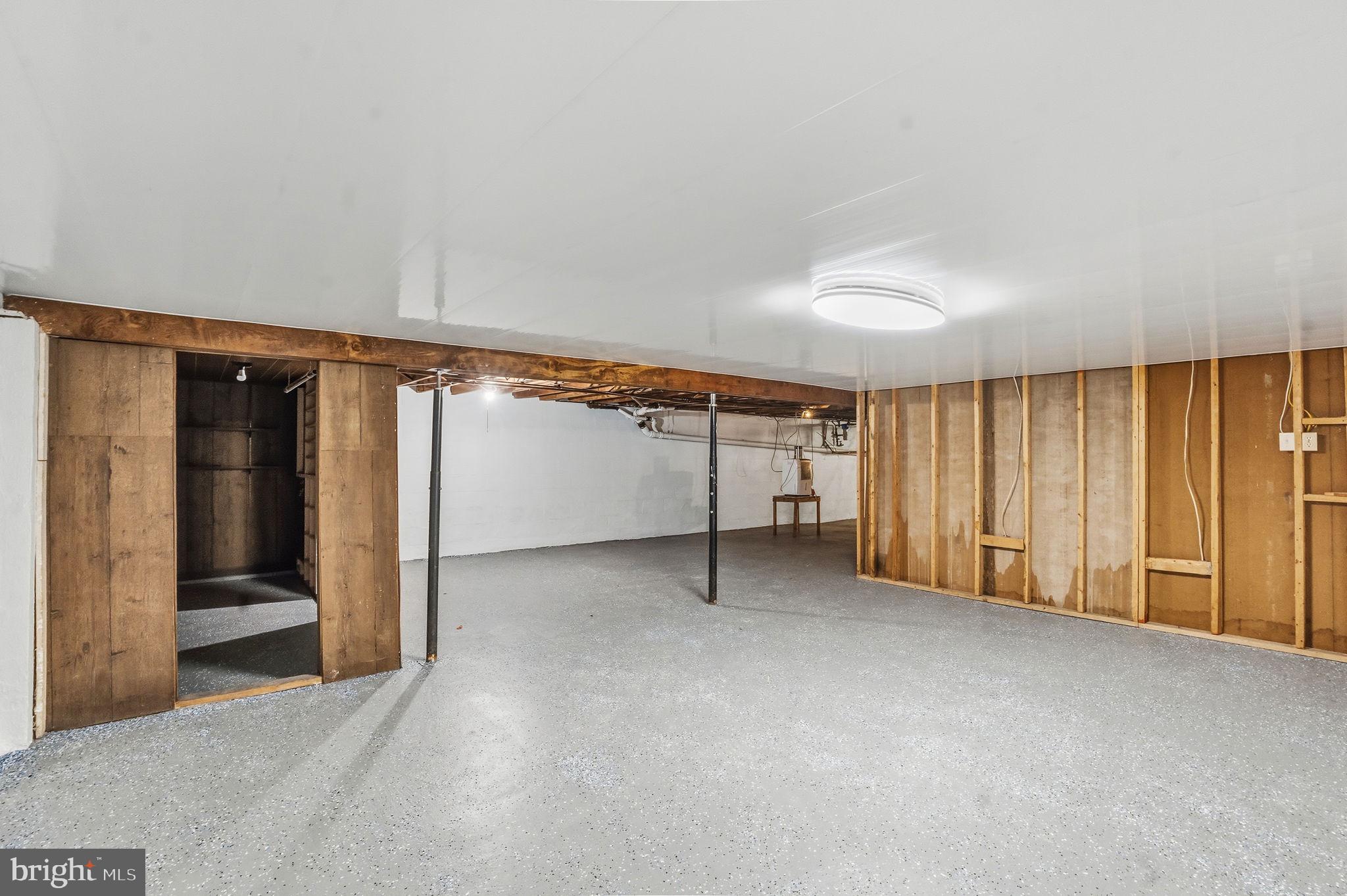 610 East Market Street Beavertown, PA 17813 - Photo 34 of 46 an empty room with a empty space and entrance