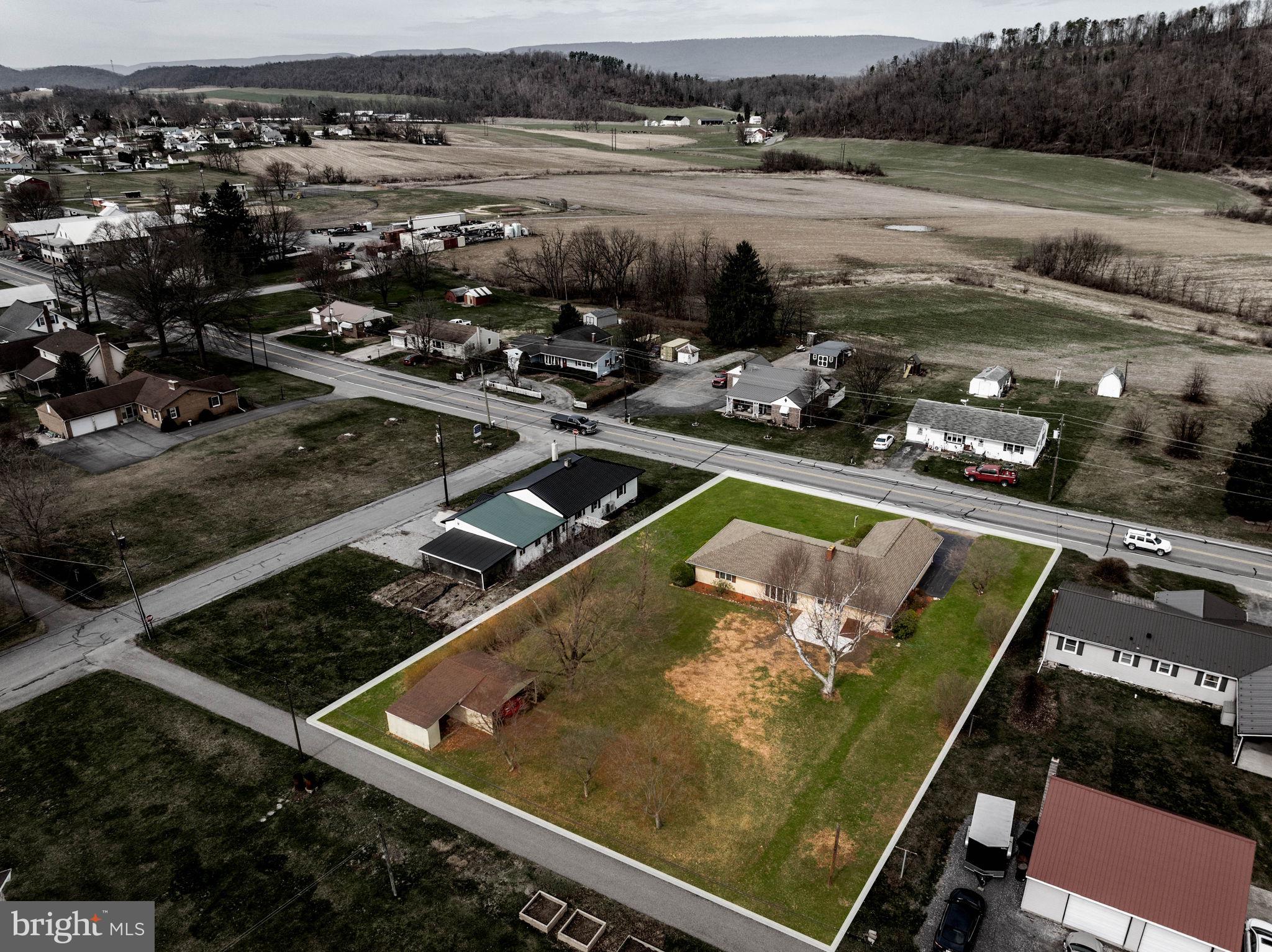 610 East Market Street Beavertown, PA 17813 - Photo 4 of 46 an aerial view of a pool and a yard