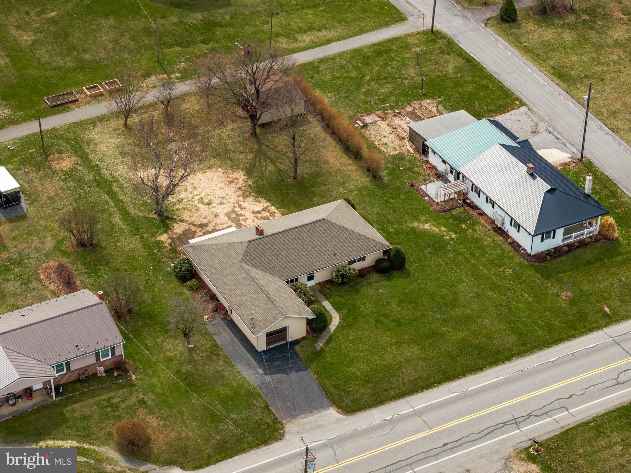 610 East Market Street Beavertown, PA 17813 - Photo 43 of 46 an aerial view of a house with a garden