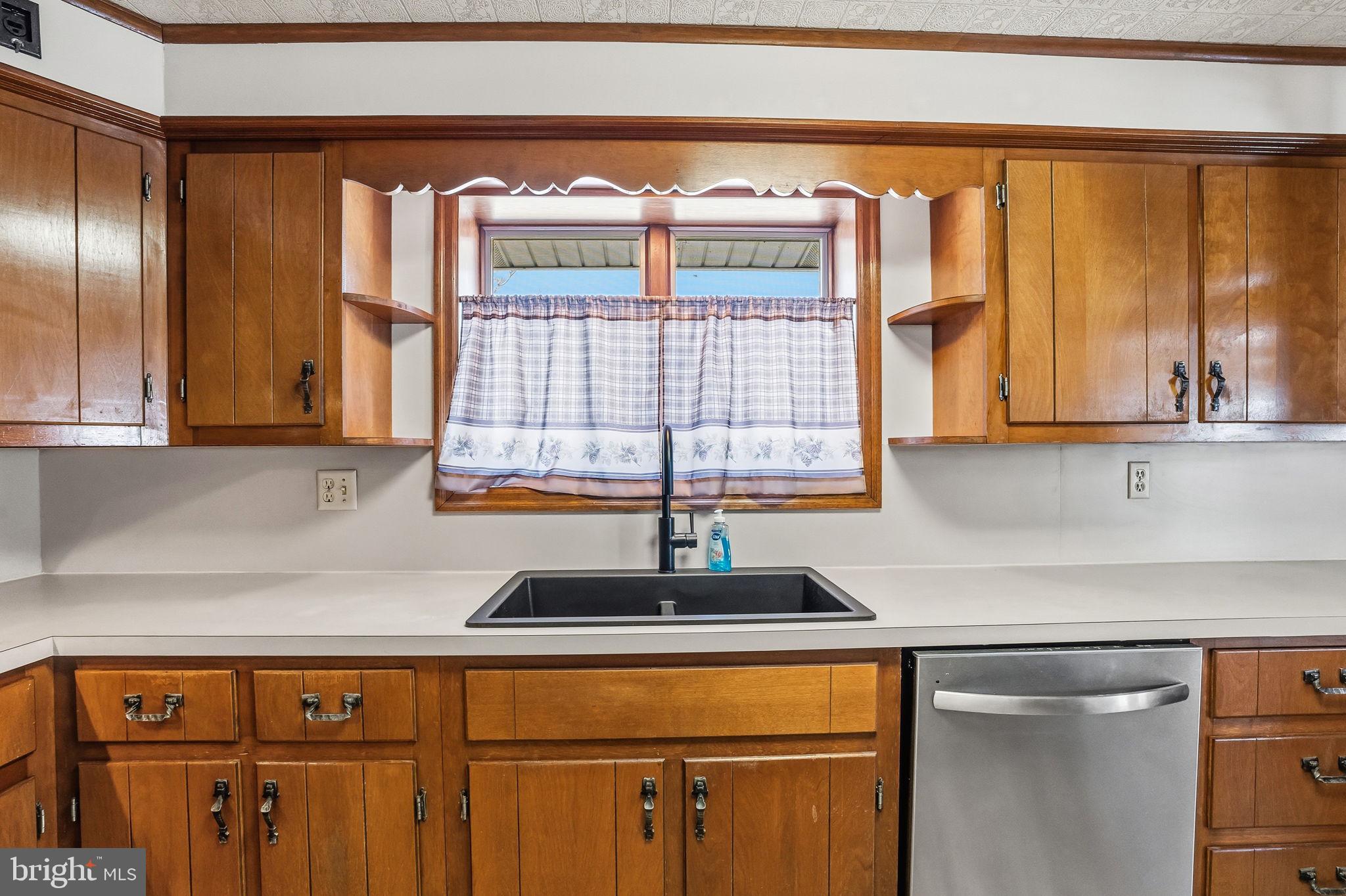 610 East Market Street Beavertown, PA 17813 - Photo 6 of 46 a kitchen with a sink and a window