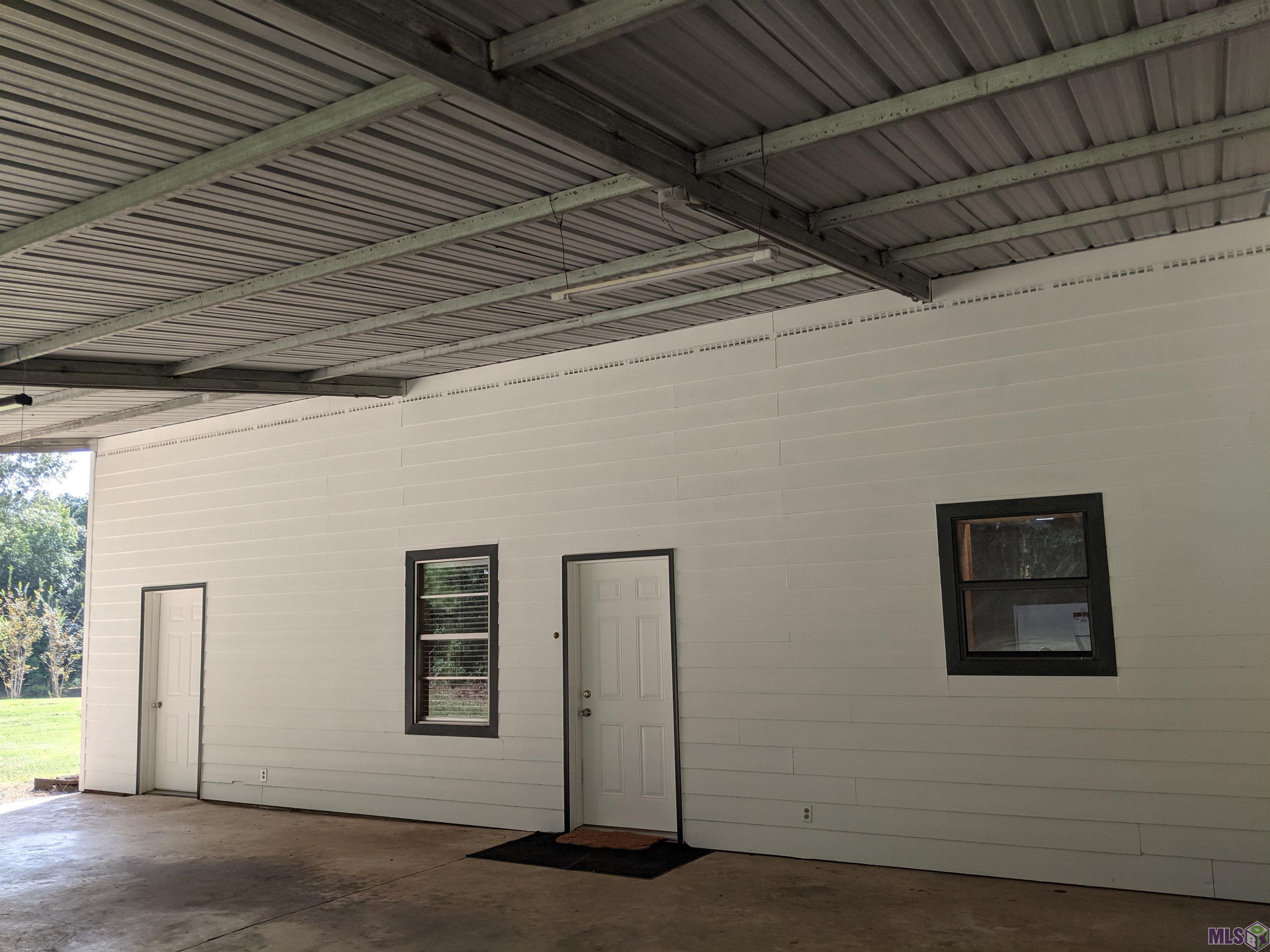 4855 Highway 952 Jackson, LA 70748 - Photo 20 of 34 Expansive Covered Carport