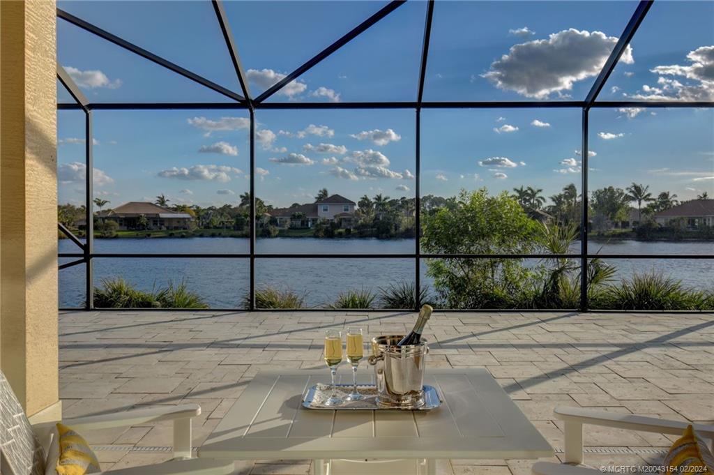 7172 Southeast Pierre Circle Stuart, FL 34997 - Photo 32 of 43 a view of a street with potted plants