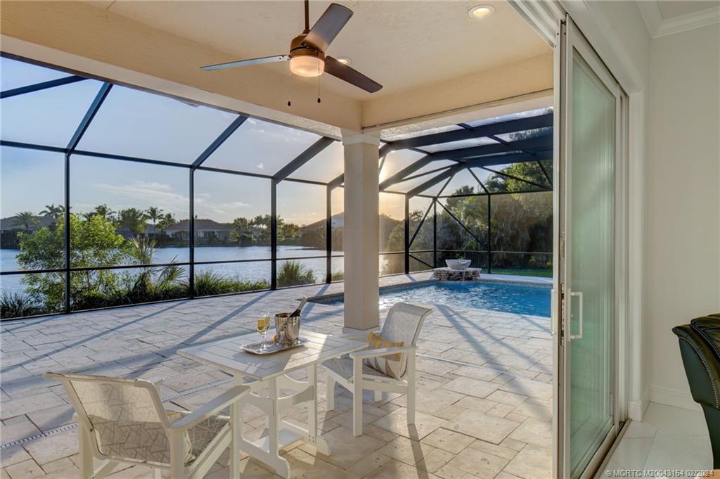 7172 Southeast Pierre Circle Stuart, FL 34997 - Photo 34 of 43 a view of room with a floor to ceiling window and an outdoor space