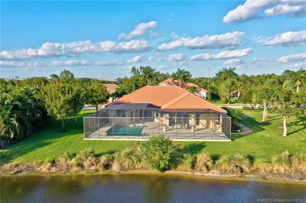 7172 Southeast Pierre Circle Stuart, FL 34997 - Photo 41 of 43 a view of a house with garden