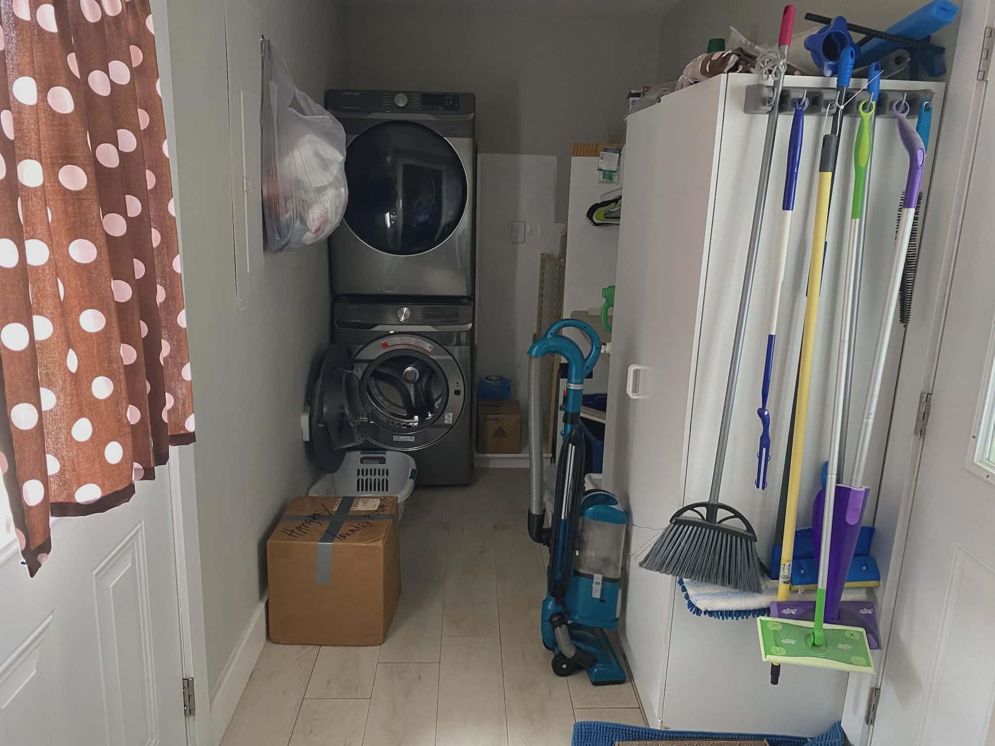 67 Cr 306 Road Iuka, MS 38852 - Photo 17 of 25 Laundry area featuring stacked washer / drying machine and baseboards