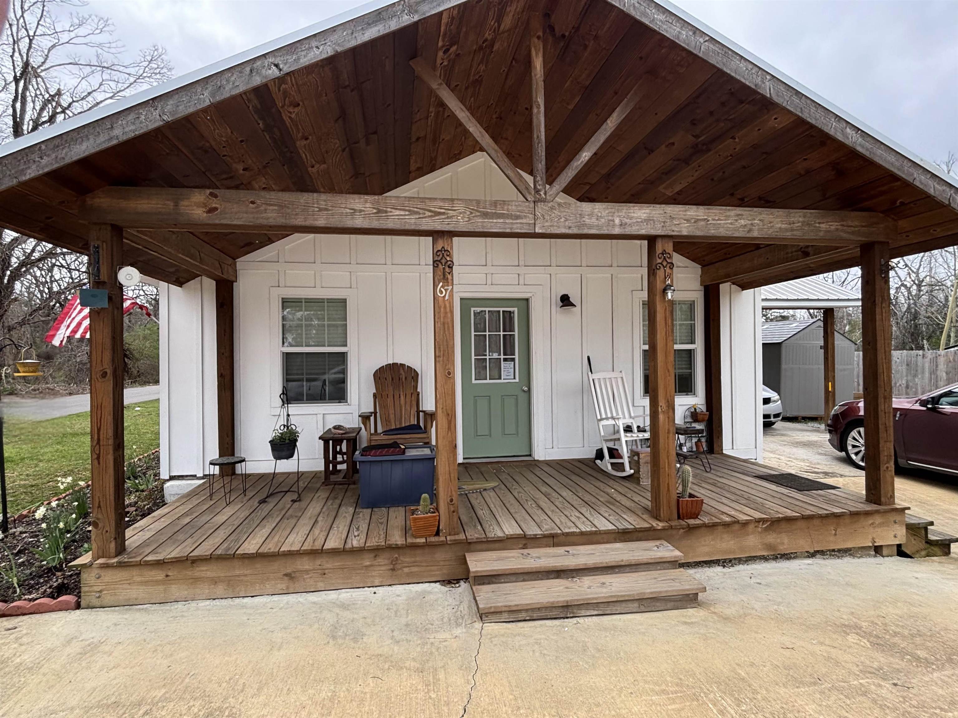 67 Cr 306 Road Iuka, MS 38852 - Photo 18 of 25 Wooden porch with a shed