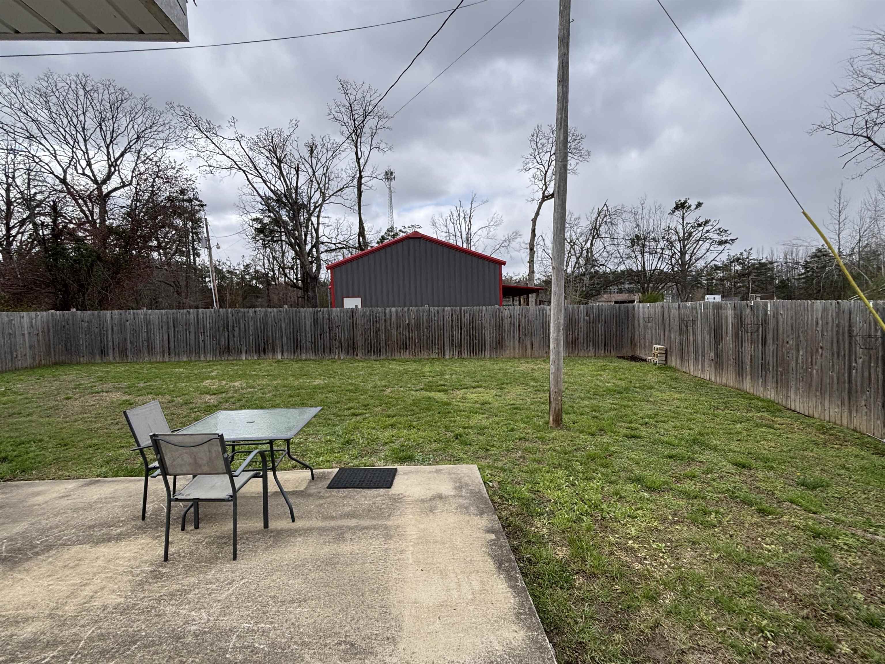 67 Cr 306 Road Iuka, MS 38852 - Photo 22 of 25 Fenced backyard featuring a patio