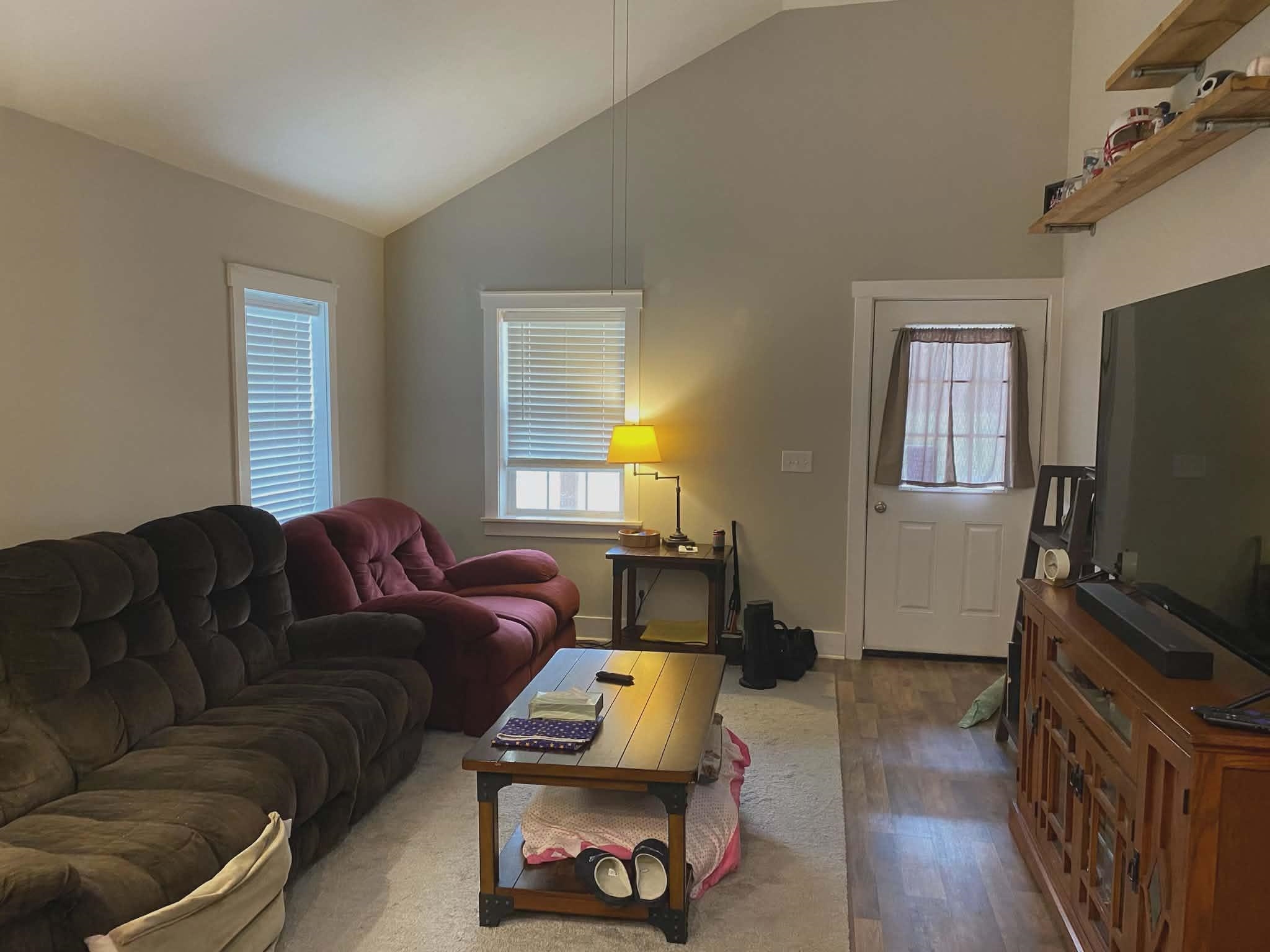 67 Cr 306 Road Iuka, MS 38852 - Photo 5 of 25 Living area with lofted ceiling, wood finished floors, and plenty of natural light