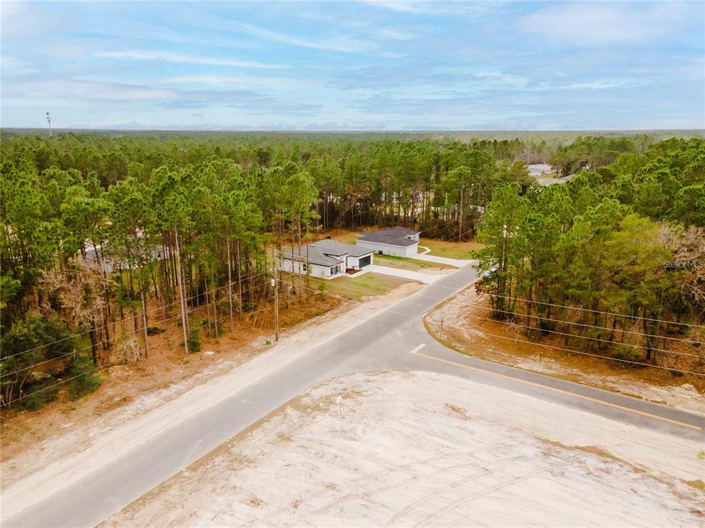 6732 Southwest 132nd Street Ocala, FL 34473 - Photo 36 of 36 a view of a swimming pool with an ocean view