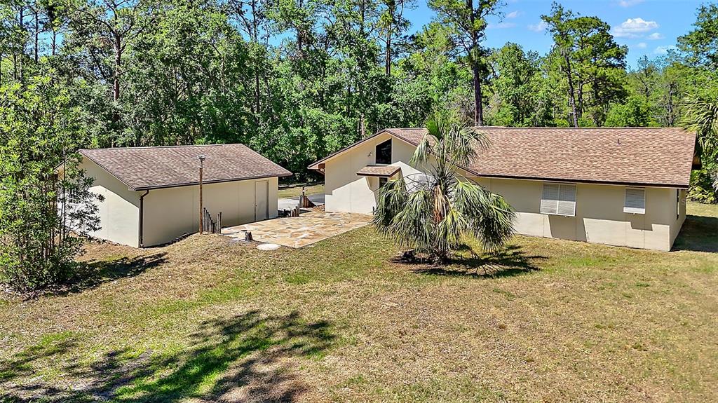 40325 Emeralda Island Road Leesburg, FL 34788 - Photo 33 of 35 Back yard cleared area and septic location ~