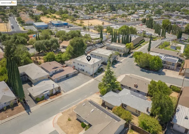 an aerial view of a city with lots of residential buildings