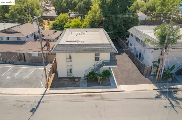 a view of a house with entrance gate