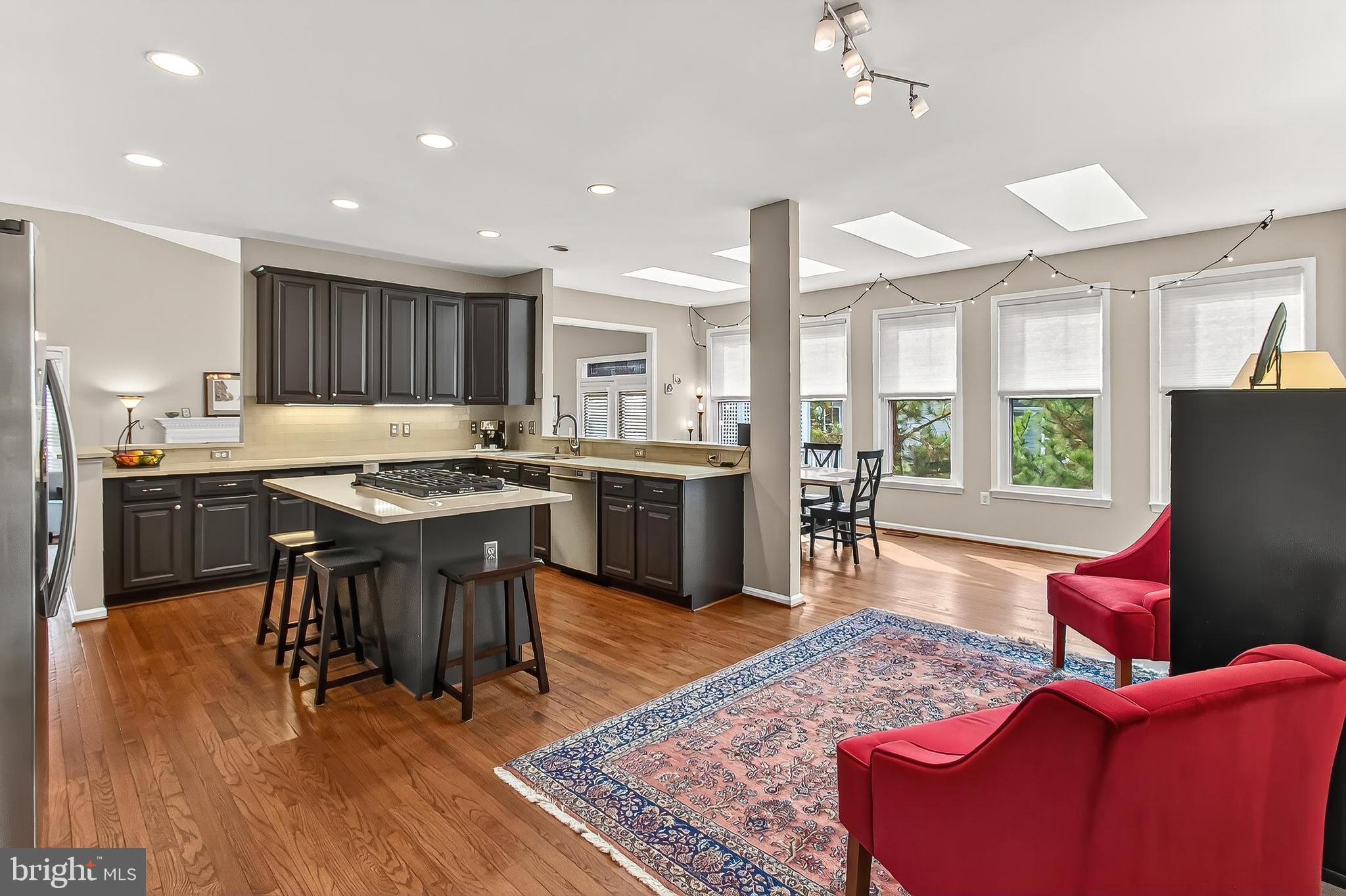 7736 White Willow Court Springfield, VA 22153 - Photo 21 of 84 Open Kitchen to Dining Space & Walls of Windows