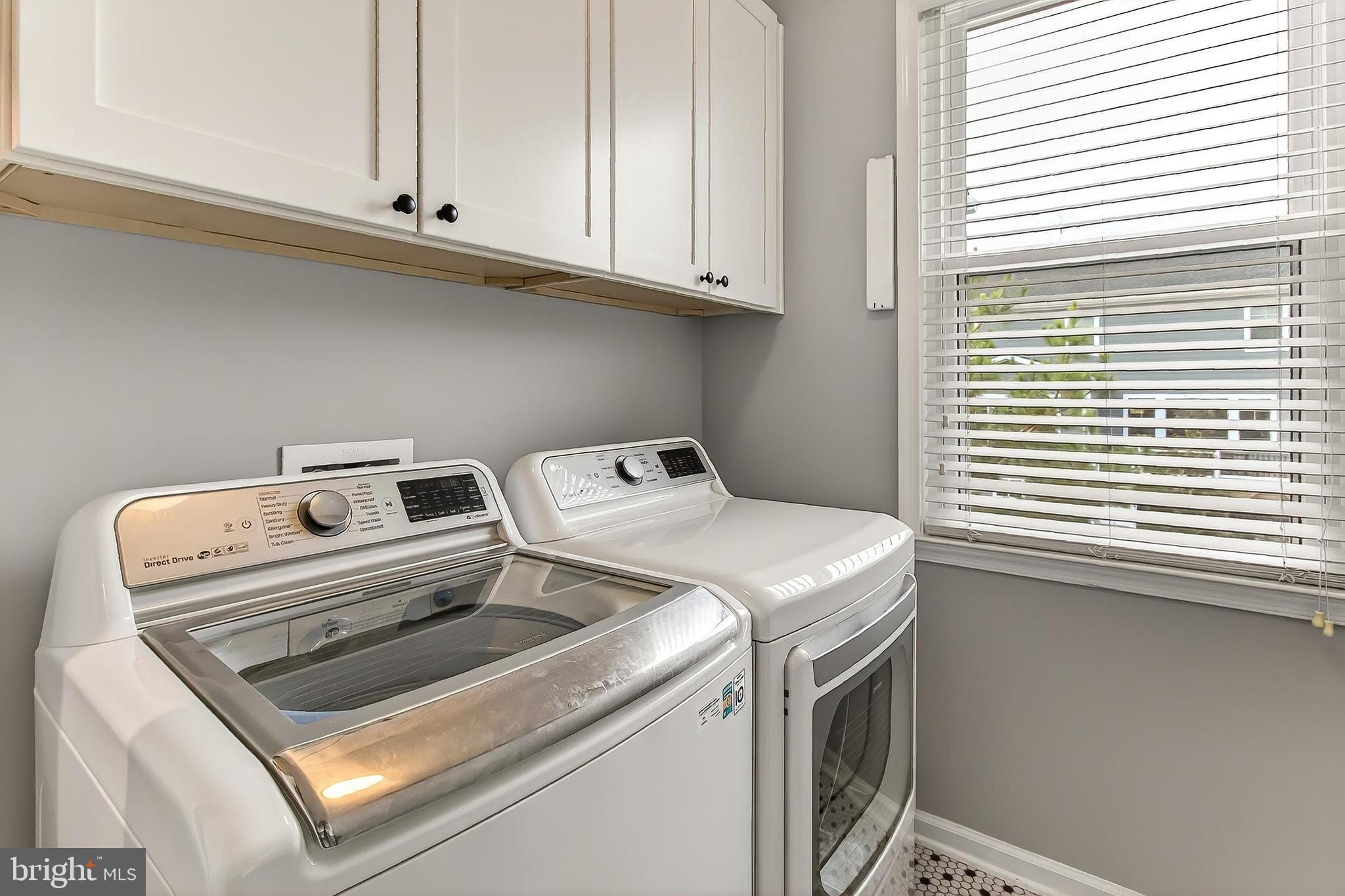 7736 White Willow Court Springfield, VA 22153 - Photo 35 of 84 Convenient Main Floor Laundry Room with Cabinetry