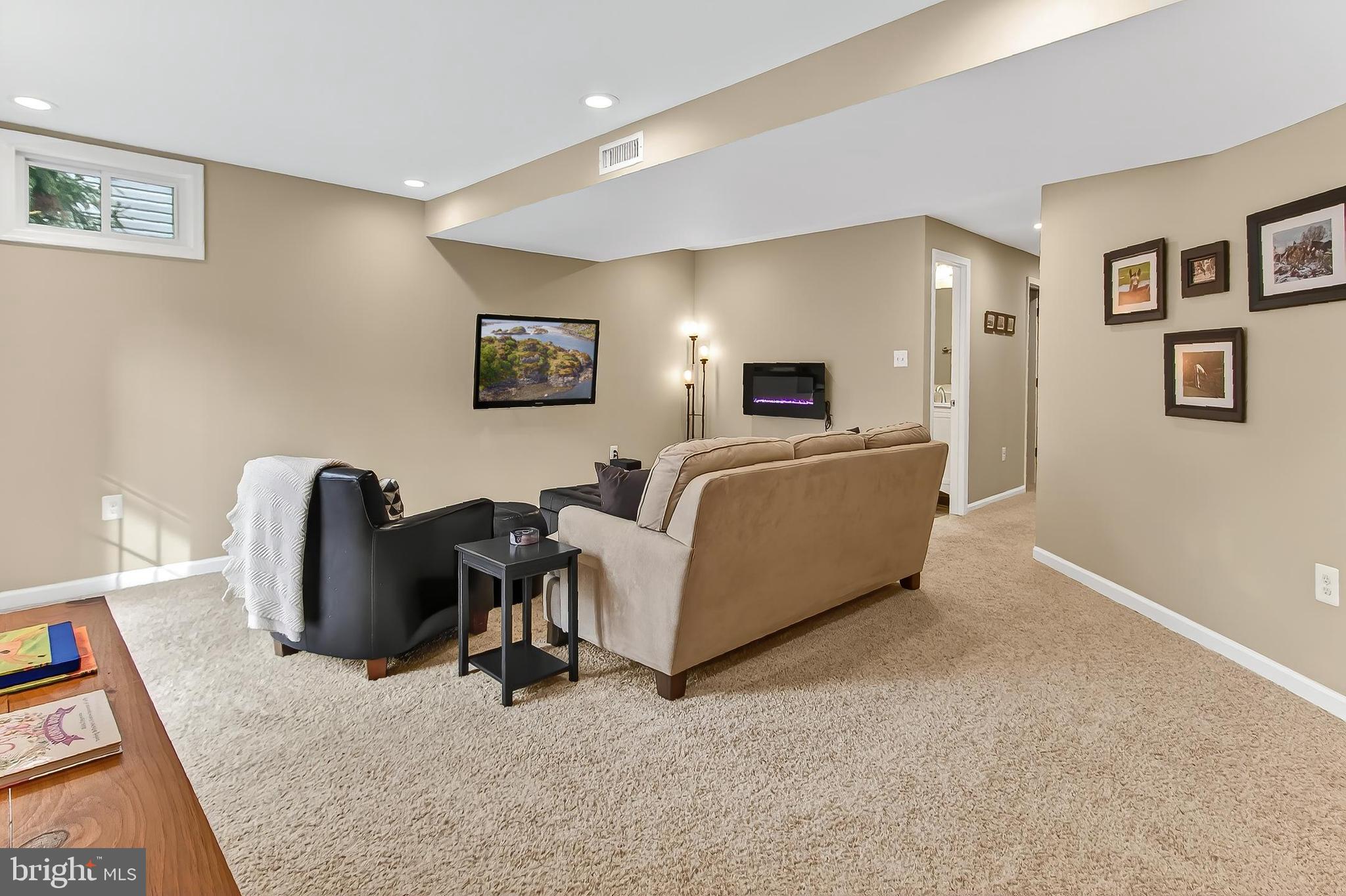 7736 White Willow Court Springfield, VA 22153 - Photo 54 of 84 Custom Electric Fireplace in Lower Level