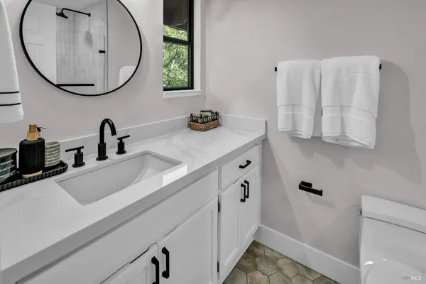 a view of a backyard of the house