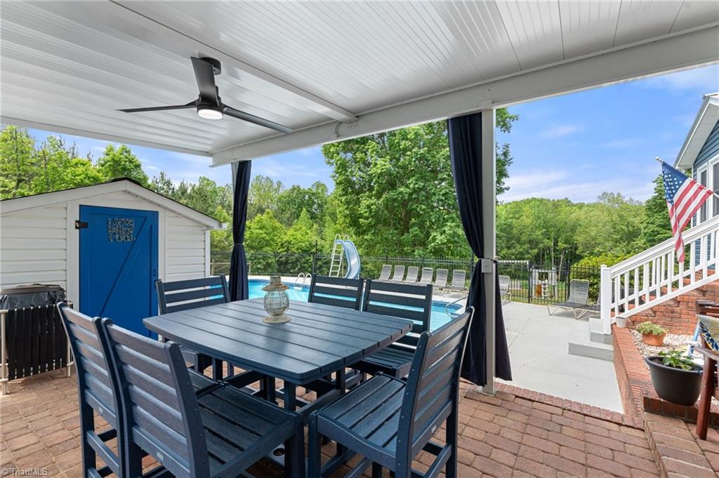 430 Haw Road Browns Summit, NC 27214 - Photo 26 of 32 patio view and pool house
