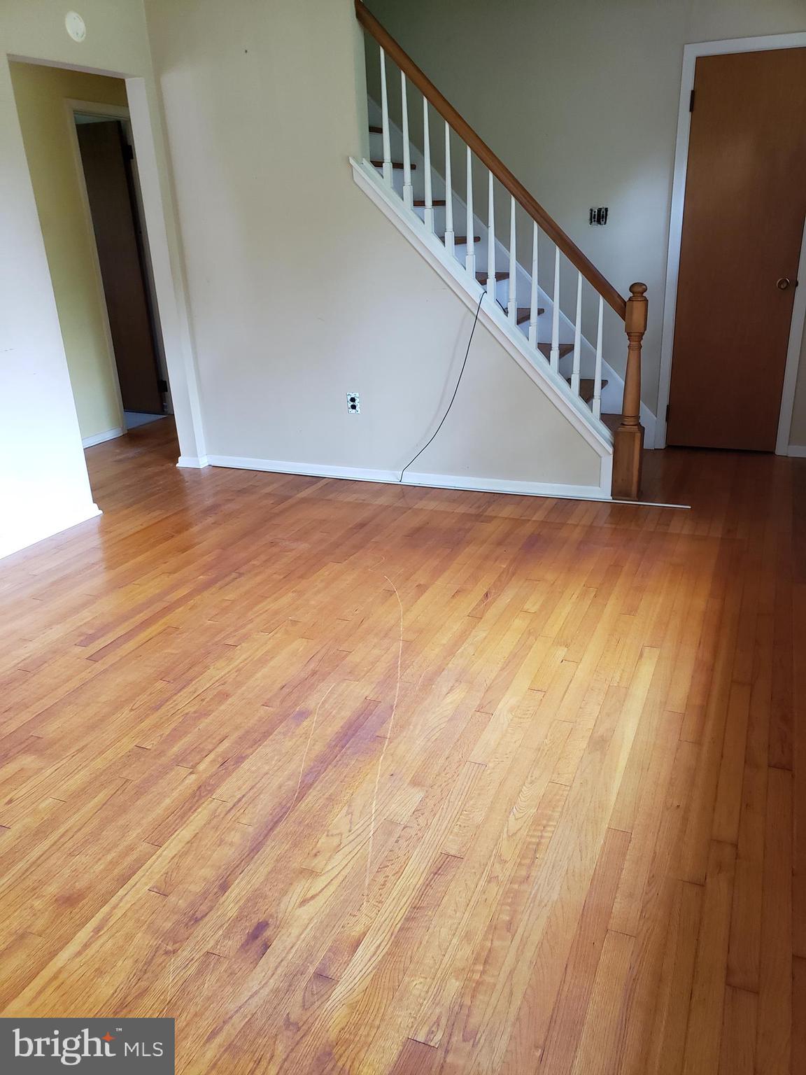 13 Woosamonsa Road Pennington, NJ 08534 - Photo 4 of 29 Living Room with Stairs to Attic