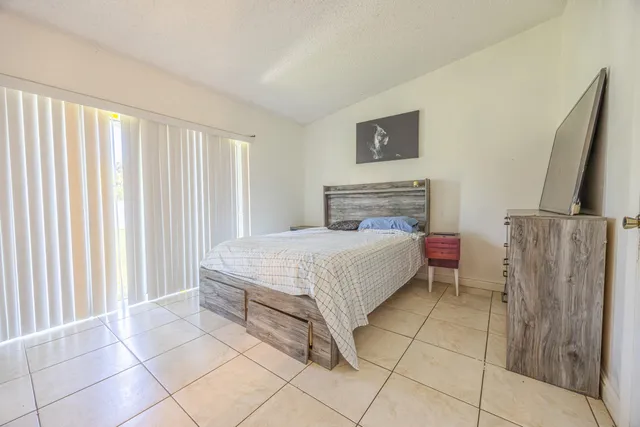 a storage room with furniture and a window