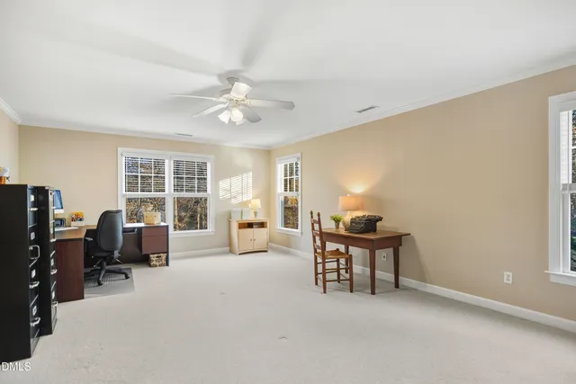 a living room with furniture and closet