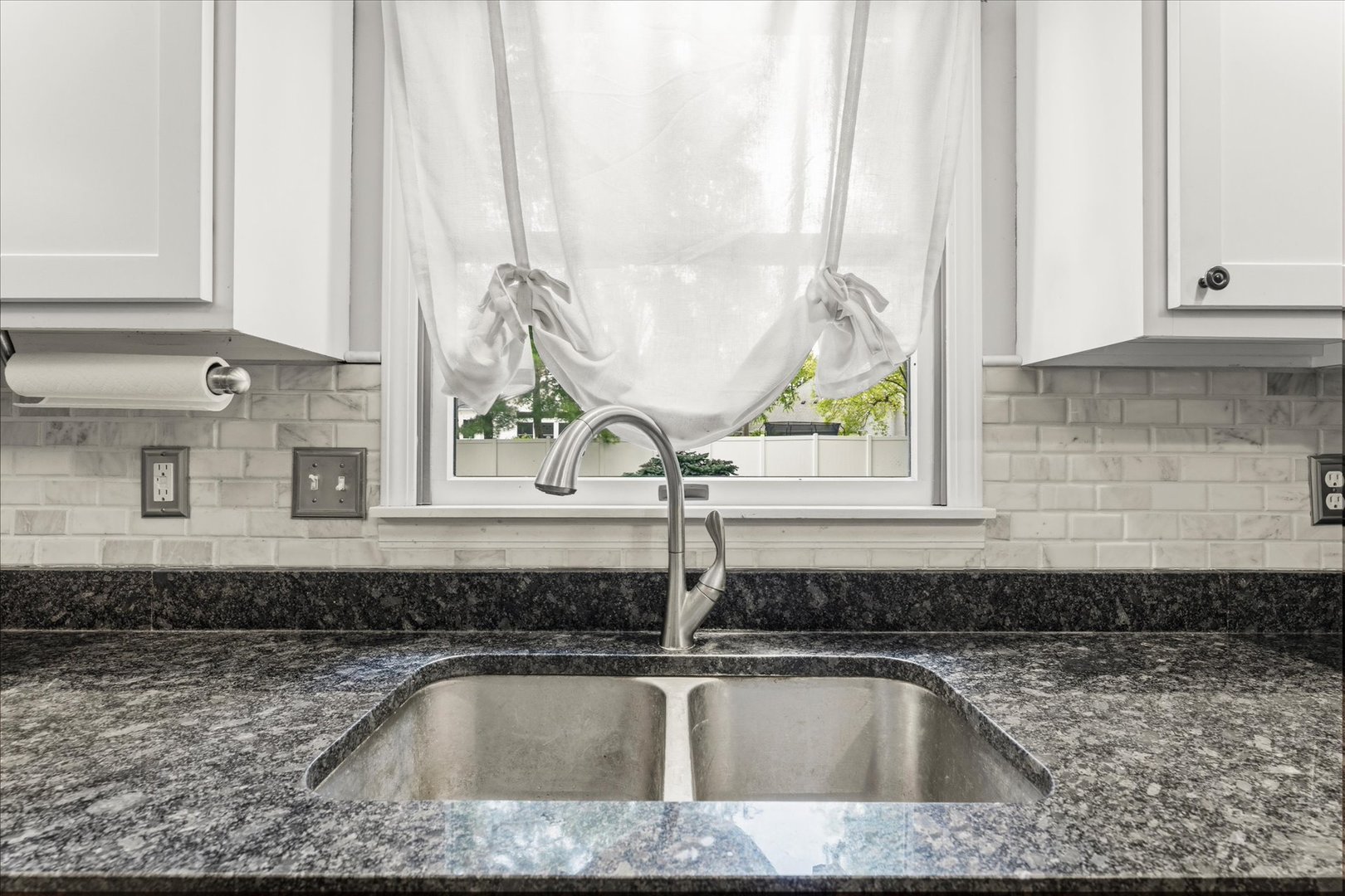 789 County Farm Road Monticello, IL 61856 - Photo 14 of 36 a kitchen with a sink granite counter tops and a window