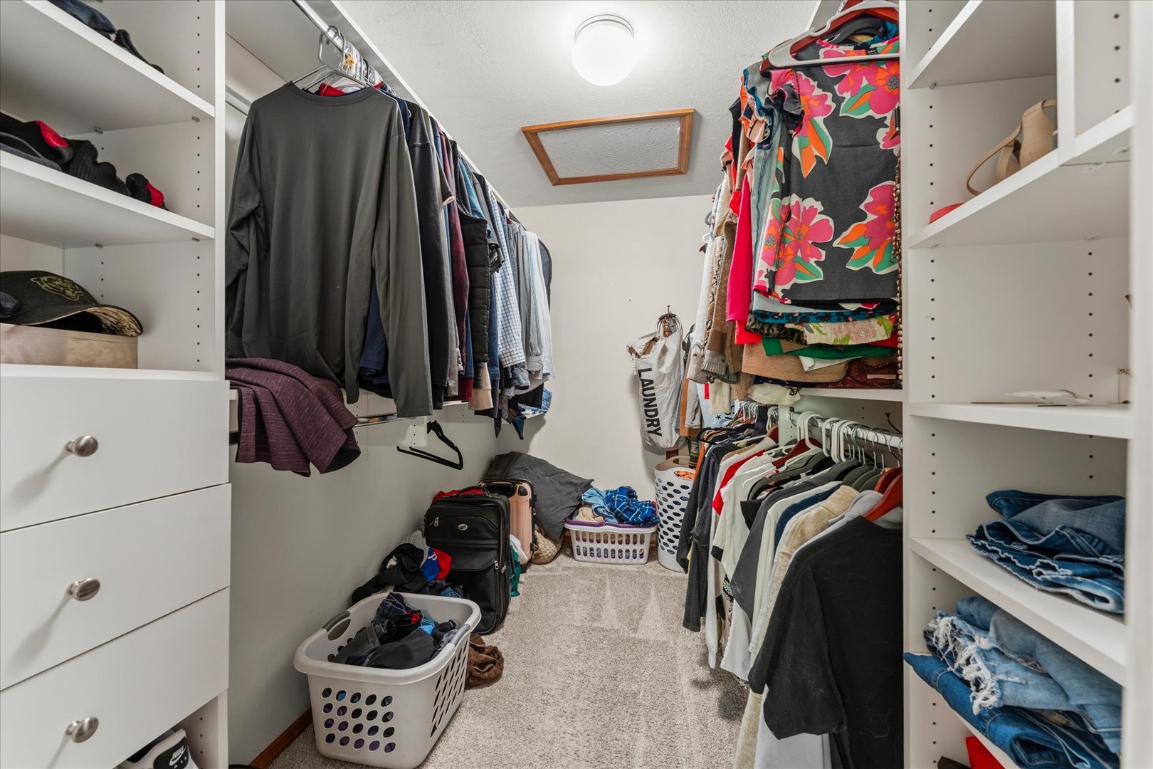 789 County Farm Road Monticello, IL 61856 - Photo 25 of 36 a view of walk in closet with clothes and shoes