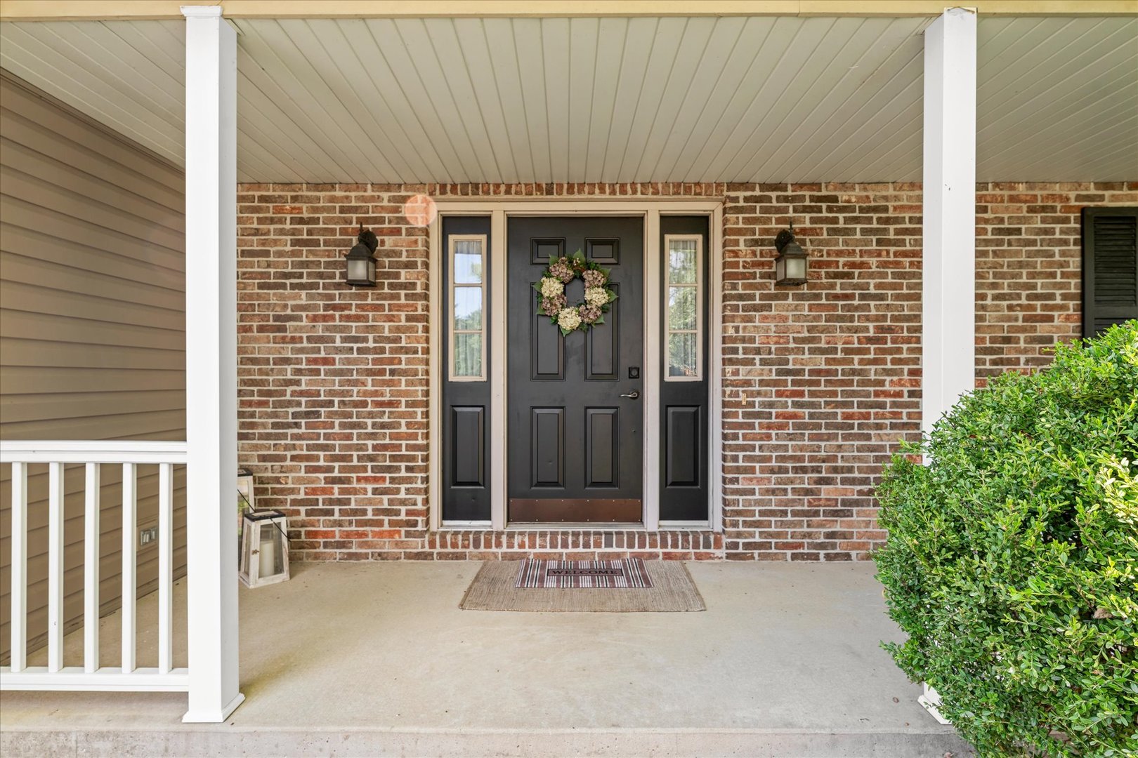 789 County Farm Road Monticello, IL 61856 - Photo 5 of 36 a couple of potted plants in front of door
