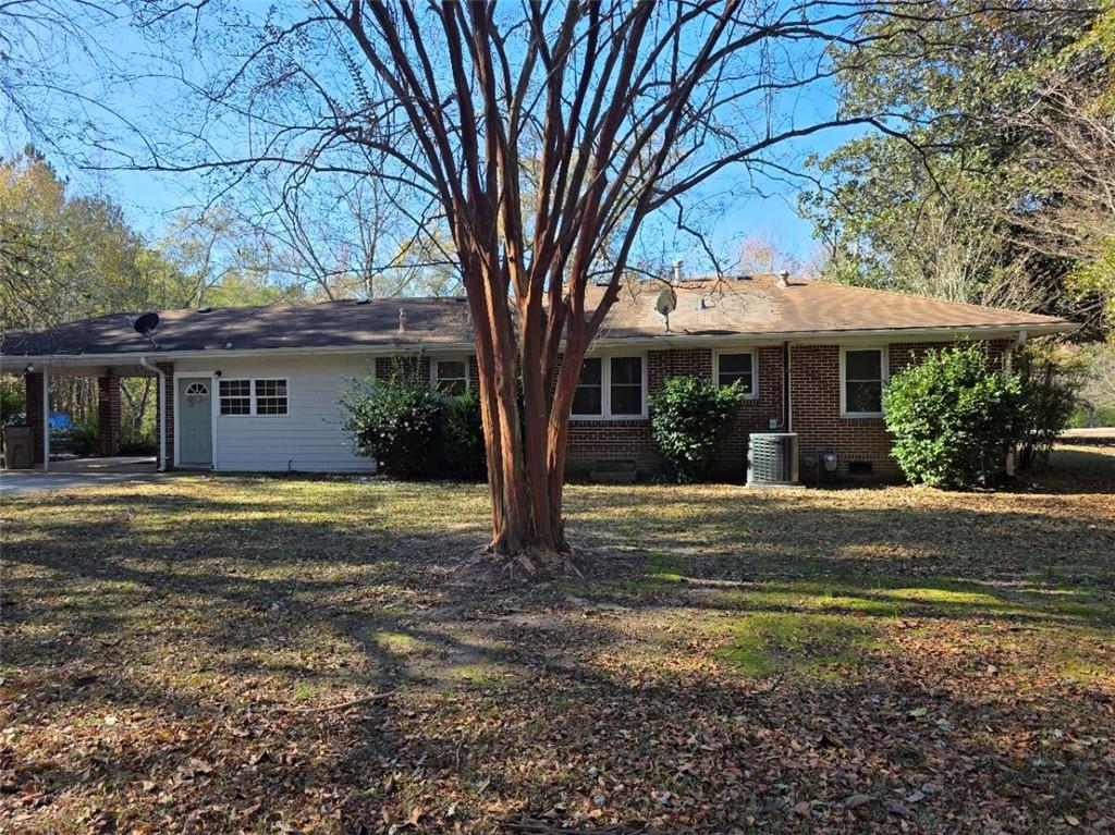 516 Monroe Highway Bethlehem, GA 30620 - Photo 4 of 10 a view of a house with a yard