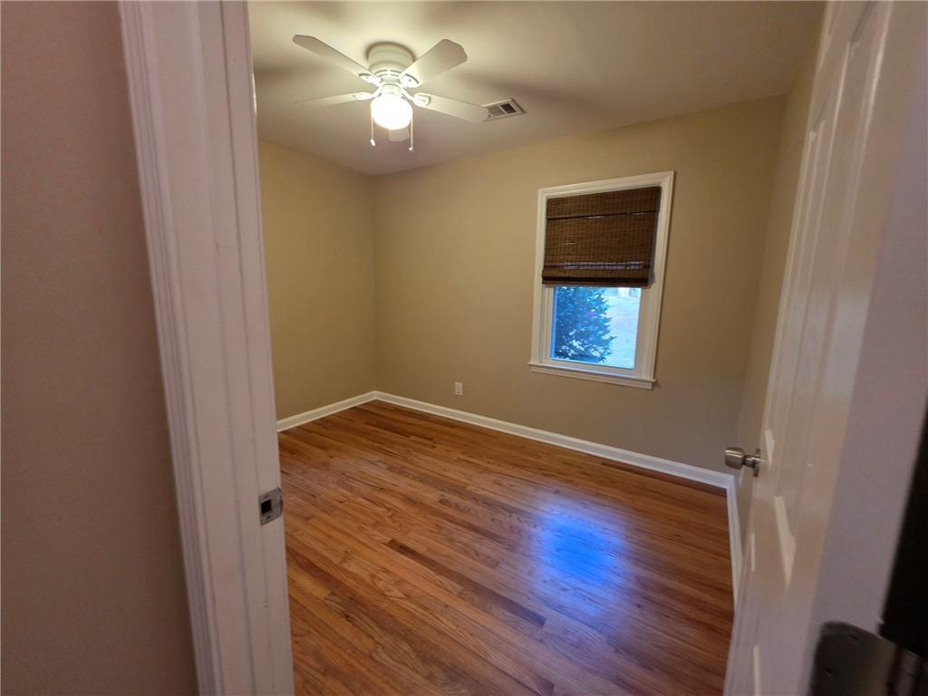 516 Monroe Highway Bethlehem, GA 30620 - Photo 9 of 10 a view of empty room with wooden floor