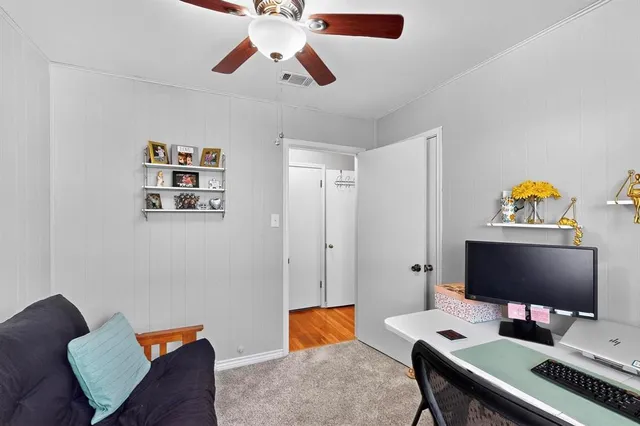 a workspace with furniture and window