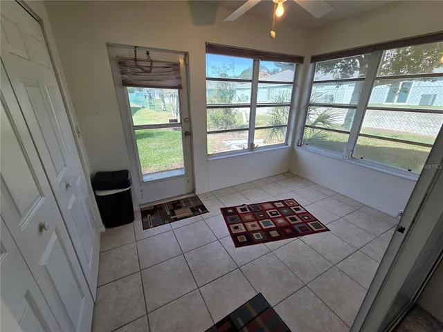 a view of livingroom with furniture and window