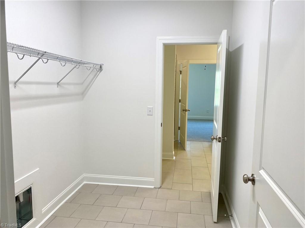 2039 Welden Ridge Road Kernersville, NC 27284 - Photo 17 of 37 Laundry Off Primary Bathroom