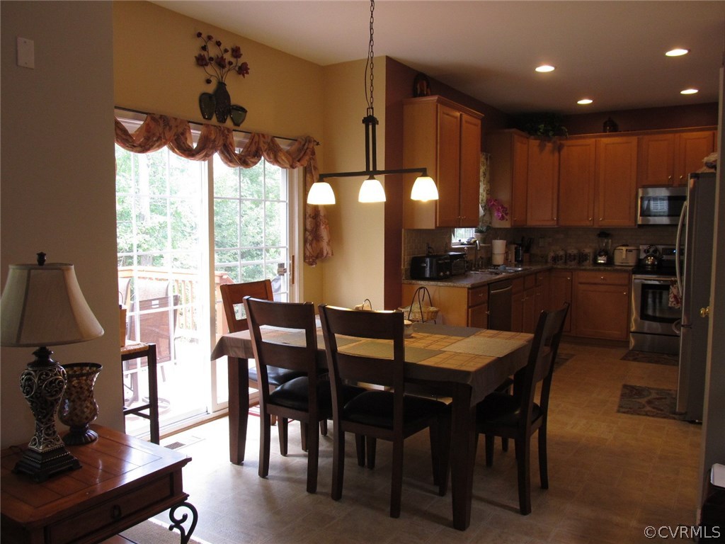 9366 Springmount Terrace Chesterfield, VA 23832 - Photo 5 of 20 a view of a dining room with furniture window and outside view