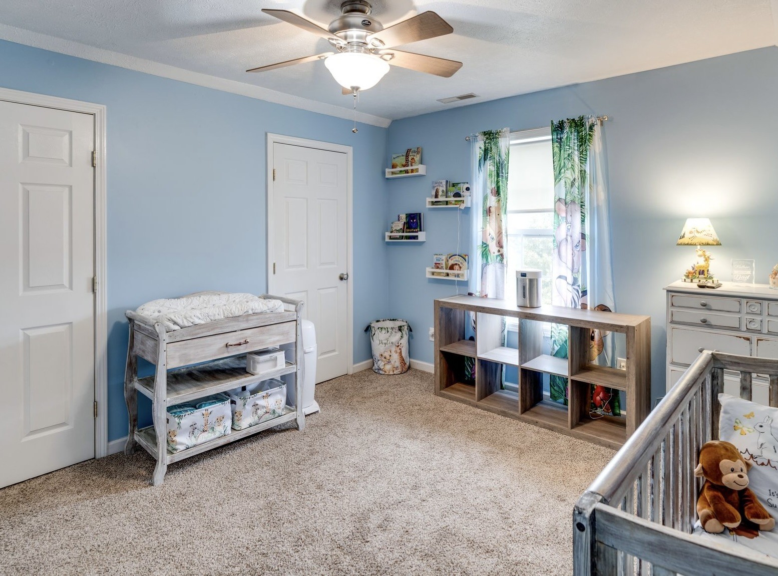365 Corinth Road Portland, TN 37148 - Photo 14 of 20 a living room with furniture and a baby crib
