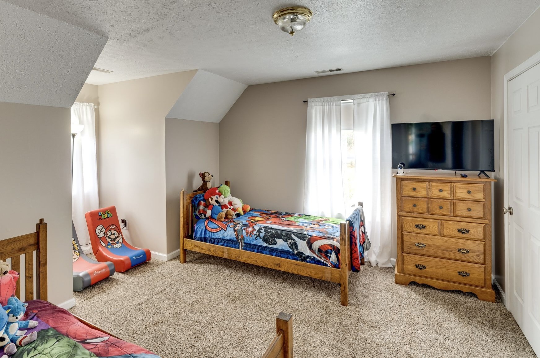 365 Corinth Road Portland, TN 37148 - Photo 16 of 20 a room with toys and a flat screen tv